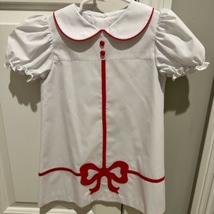 White & red Christmas dressed. Used but in VERY good condition, looks new.
